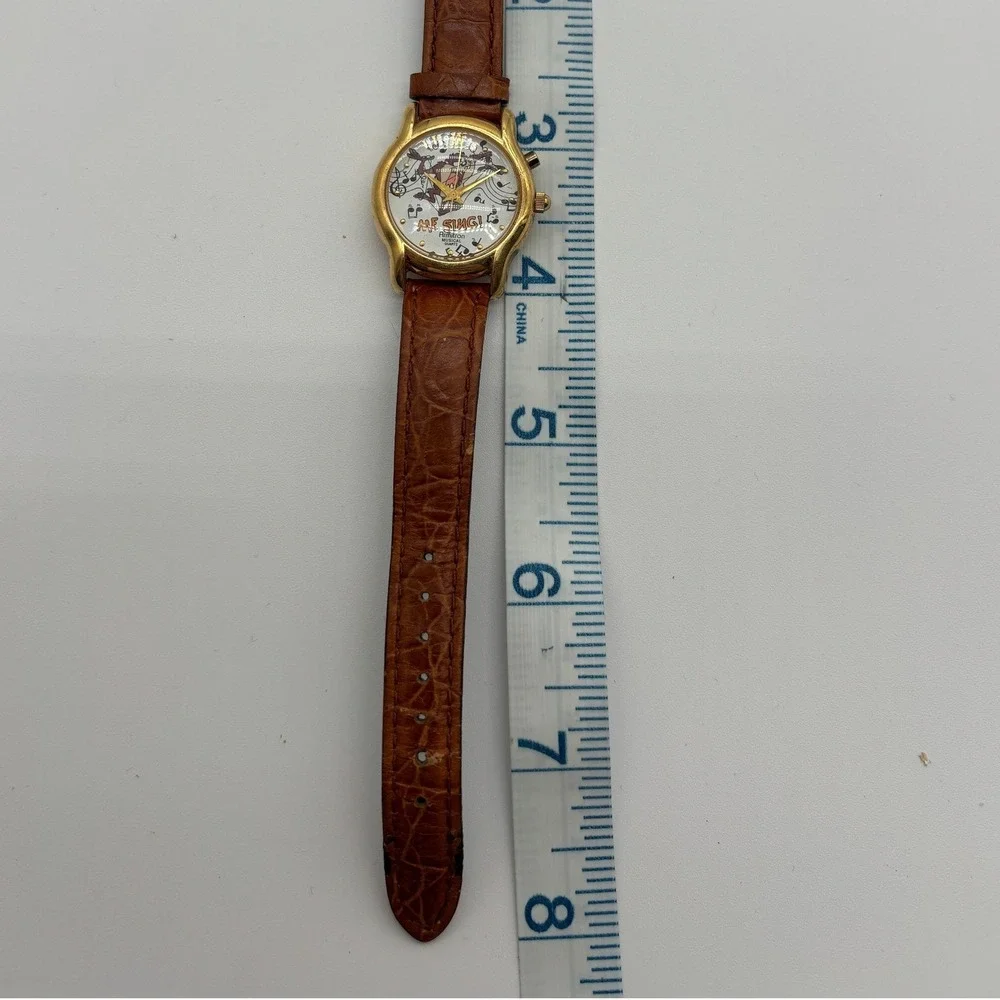 Armitron Me Sing Taz Musical Quartz‎ Watch Unisex Gold Tone Leather